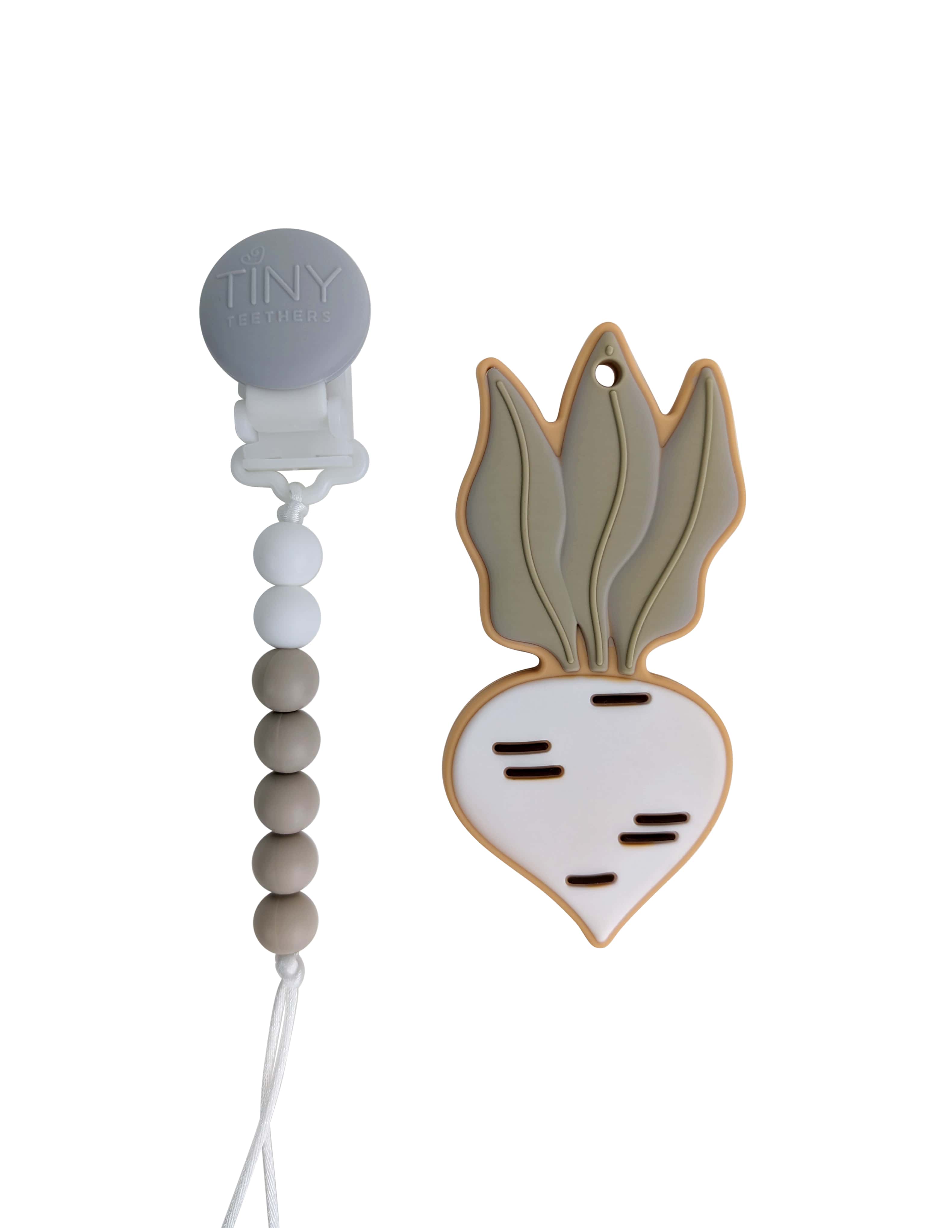 vegetable teether on a pacifier clip